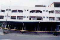 Street front building with arcade at the first floor (contemporary construction)