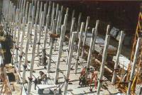 Precast, prestressed concrete frame structure with concrete shear walls 