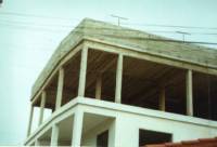 Gravity designed reinforced concrete frame buildings with unreinforced masonry infill walls.