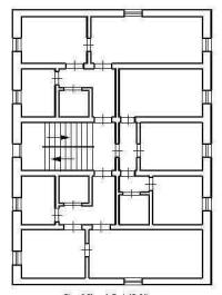 Two-story unreinforced brick masonry building with wooden floors