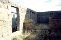 Houses with mud walls and thatch roofs 