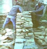 uncoarsed rubble stone masonry walls with timber floor and roof