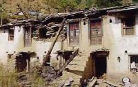 uncoarsed rubble stone masonry walls with timber floor and roof