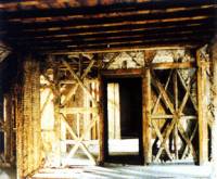 Historic, braced frame timber buildings with masonry infill ('Pombalino' buildings)