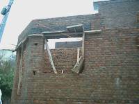 Unreinforced brick masonry residential building