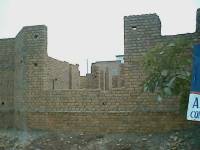 Unreinforced brick masonry residential building