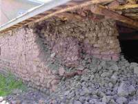    Stonework building with wooden timber roof 