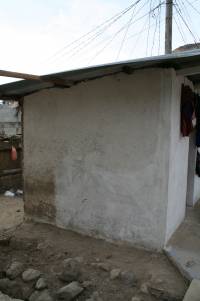 Adobe with sawn timber roof framing and corrugated iron sheeting