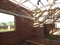 Unreinforced masonry houses made of fired clay bricks