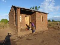 Unreinforced masonry houses made of fired clay bricks