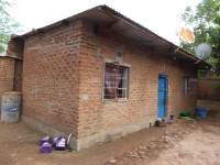 Unreinforced masonry houses made of fired clay bricks