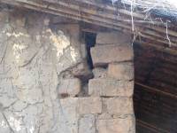 Unreinforced masonry houses made of fired clay bricks