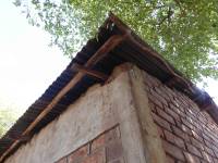 Unreinforced masonry houses made of fired clay bricks