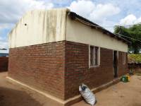 Unreinforced masonry houses made of fired clay bricks