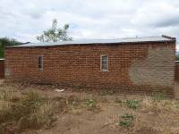 Unreinforced masonry houses made of fired clay bricks