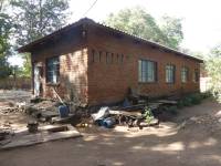 Unreinforced masonry houses made of fired clay bricks