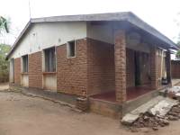 Unreinforced masonry houses made of fired clay bricks