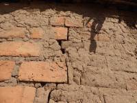 Unreinforced masonry houses made of fired clay bricks