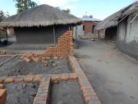 Unreinforced masonry houses made of fired clay bricks