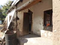 Unreinforced masonry houses made of fired clay bricks