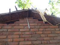 Unreinforced masonry houses made of fired clay bricks