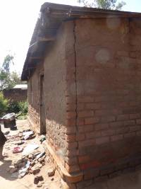 Unreinforced masonry houses made of fired clay bricks