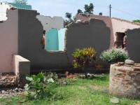 Unreinforced masonry houses made of fired clay bricks