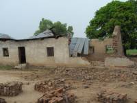 Unreinforced masonry houses made of fired clay bricks