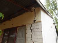 Unreinforced masonry houses made of fired clay bricks