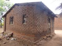 Unreinforced masonry houses made of fired clay bricks