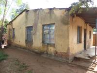 Unreinforced masonry houses made of fired clay bricks