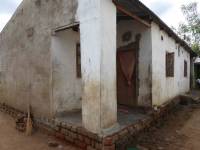 Unreinforced masonry houses made of fired clay bricks