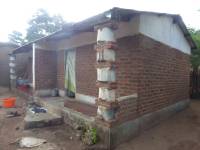 Unreinforced masonry houses made of fired clay bricks