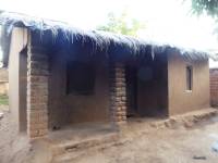 Unreinforced masonry houses made of fired clay bricks