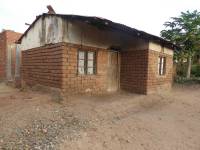 Unreinforced masonry houses made of fired clay bricks