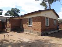 Unreinforced masonry houses made of fired clay bricks